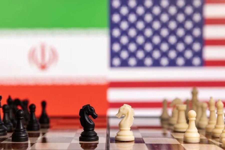 Chess pieces are seen in front of displayed Iran's and US flags in this illustration taken Jan 25, 2022 -- Reuters/Files