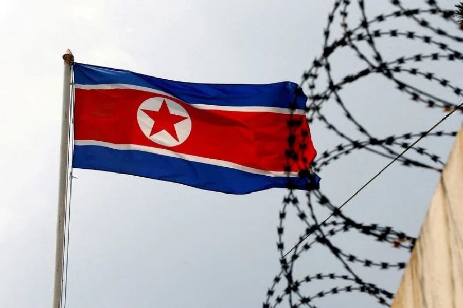 A North Korea flag flutters next to concertina wire at the North Korean embassy in Kuala Lumpur, Malaysia March 9, 2017. REUTERS/Edgar Su/File Photo/File Photo