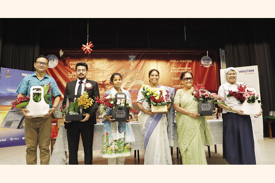 The guests of the Fourth Inter College Language Fest arranged by Holy College English Language Club were greeted with flowers