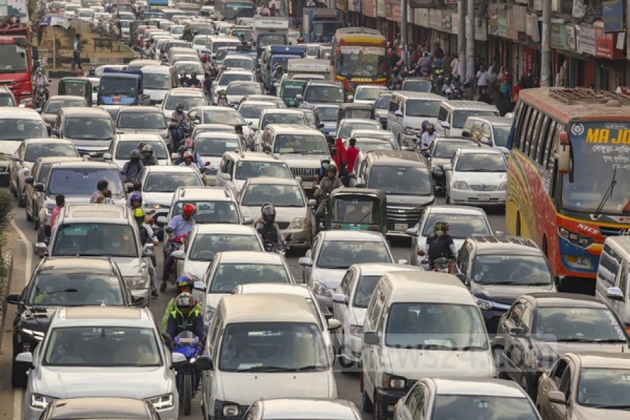 Private cars are stuck in a traffic jam on the road in Dhaka’s Banani.