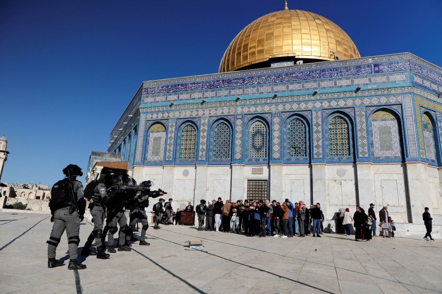 Israeli security forces move in positions during clashes with Palestinian protestors at the compound that houses Al-Aqsa Mosque, known to Muslims as Noble Sanctuary and to Jews as Temple Mount, in Jerusalem's Old City on April 15, 2022 — Reuters photo