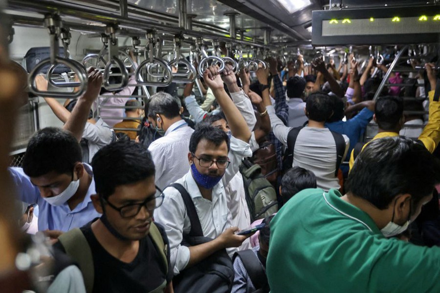 Commuters travel in a packed train in Mumbai, India on February 25, 2022 — Reuters photo