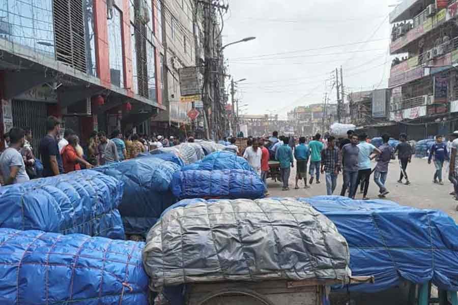 New Market shops start reopening, Dhaka College students demand justice