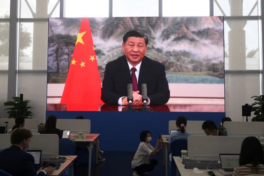 A screen shows Chinese President Xi Jinping delivering a keynote speech at the opening ceremony of the Boao Forum for Asia via video link, at a media centre in Boao, Hainan province, China April 21, 2022. REUTERS/Kevin Yao