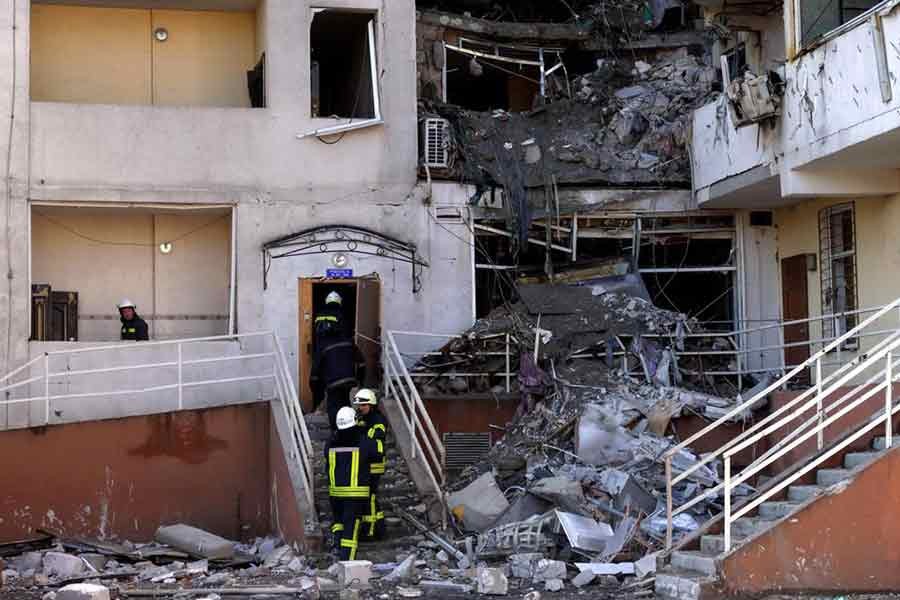 Rescuers working to remove debris from a building that was hit in a military strike in Odesa of Ukraine on Sunday –Reuters photo