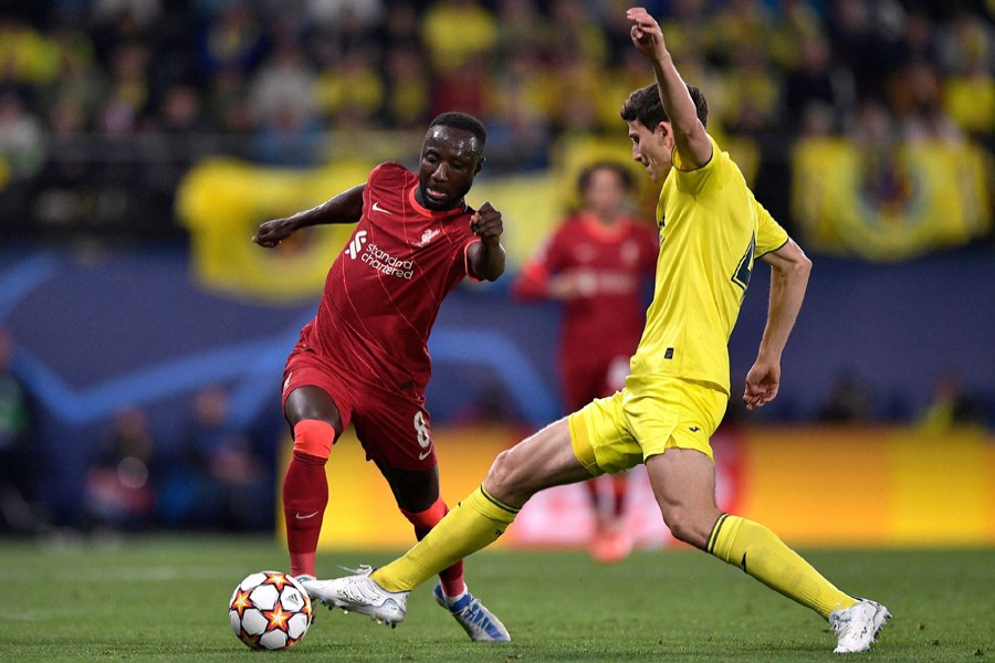 Liverpool's Naby Keita in action with Villarreal's Pau Torres in Champions League Semi Final against at Estadio de la Ceramica in Villarreal, Spain on May 3, 2022 — Reuters photo