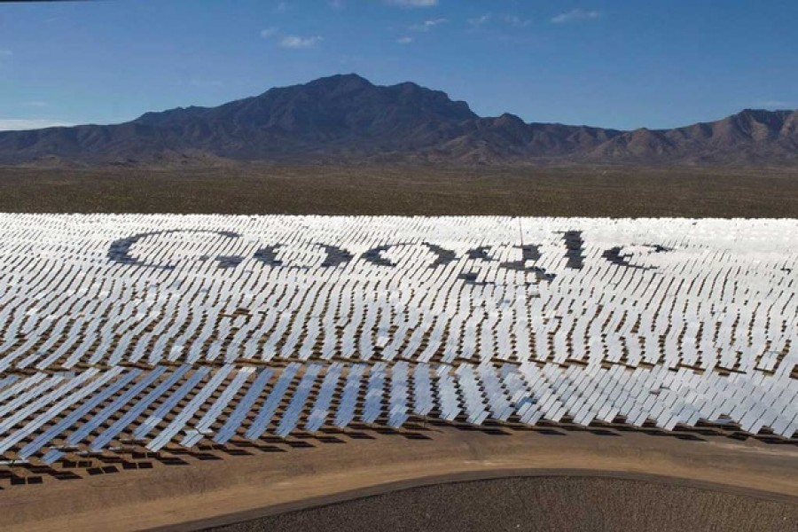 The Google logo is spelled out in heliostats (mirrors that track the sun and reflect the sunlight onto a central receiving point) during a tour of the Ivanpah Solar Electric Generating System in the Mojave Desert near the California-Nevada border February 13, 2014 – Reuters/Files