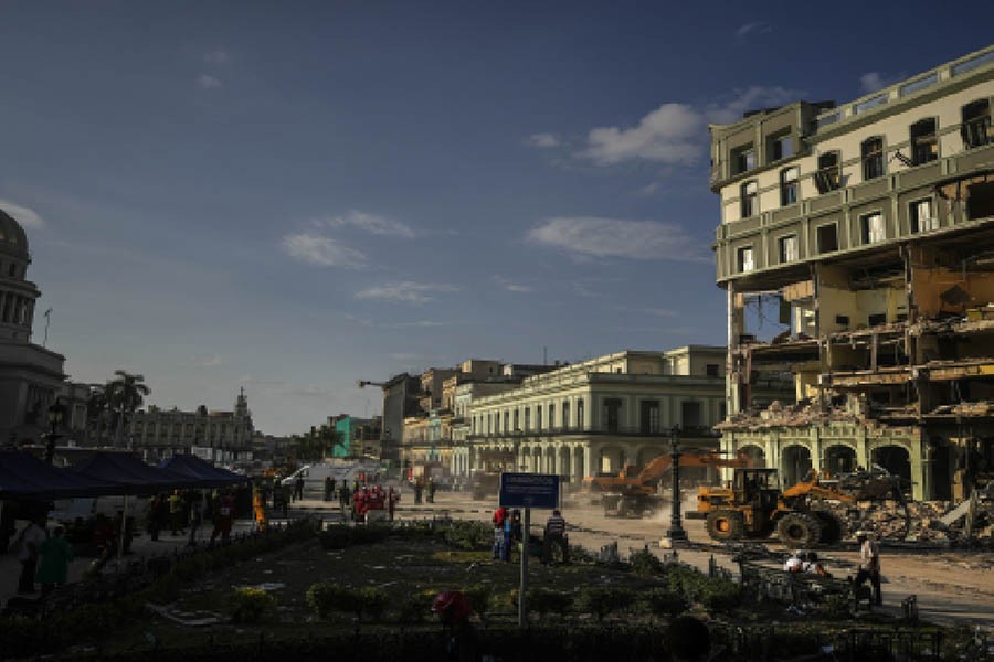 Rescuers look for victims at Cuba hotel after blast kills 25