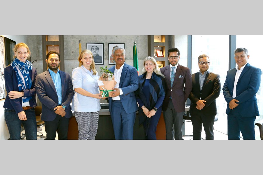 BGMEA President Faruque Hassan is seen with a delegation of Aldi, a German-based international retailer, at the trade body's Gulshan office on Wednesday