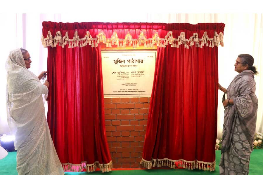 Prime Minister Sheikh Hasina and her younger sister Sheikh Rehana, the two daughters of Father of the Nation Bangabandhu Sheikh Mujibur Rahman, jointly laid the foundation stone of Mujib Pathagar of Father of the Nation Bangabandhu Sheikh Mujibur Rahman Memorial Trust on Saturday –PID Photo