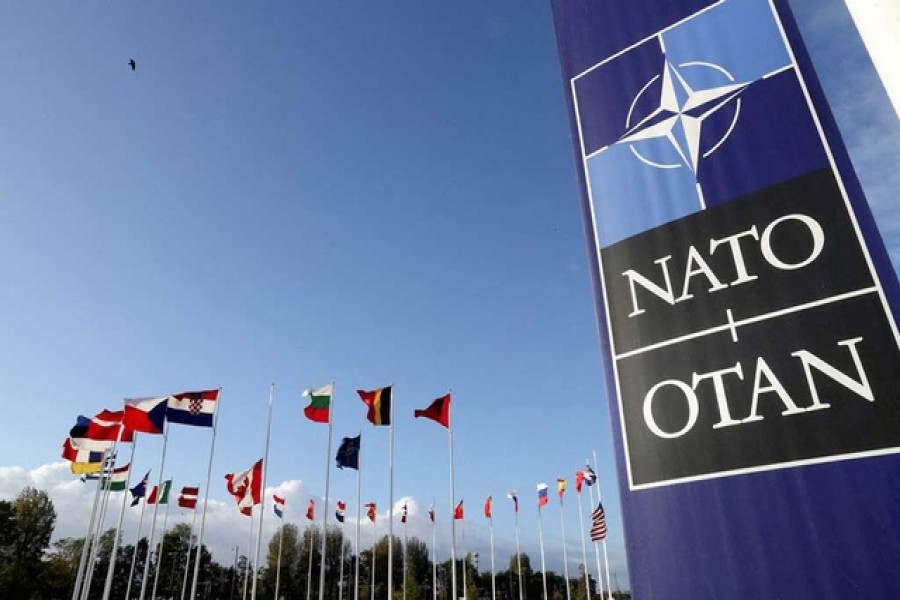 Flags wave outside the Alliance headquarters ahead of a NATO Defence Ministers meeting, in Brussels, Belgium, October 21, 2021. REUTERS/Pascal Rossignol/File Photo/File Photo