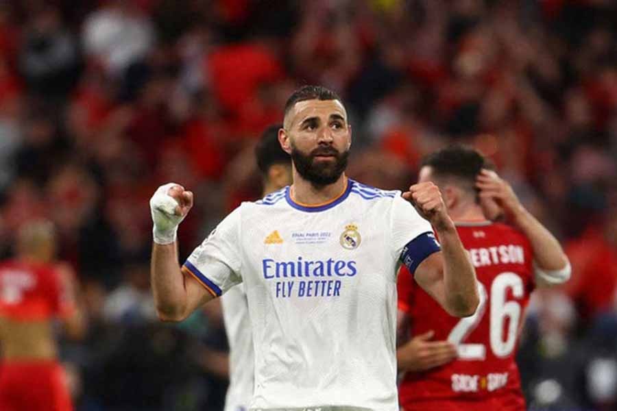 Football - Champions League Final - Liverpool v Real Madrid - Stade de France, Saint-Denis near Paris, France - May 28, 2022 Real Madrid's Karim Benzema celebrates after winning the Champions League REUTERS/Kai Pfaffenbach/File Photo