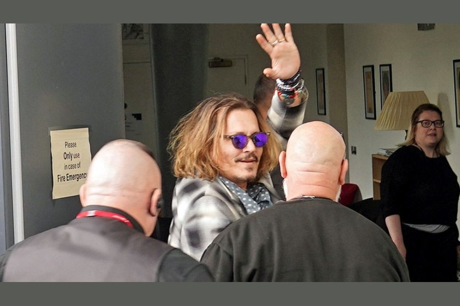 Johnny Depp entering the Sage concert hall in Gateshead before Thursday's show - Reuters