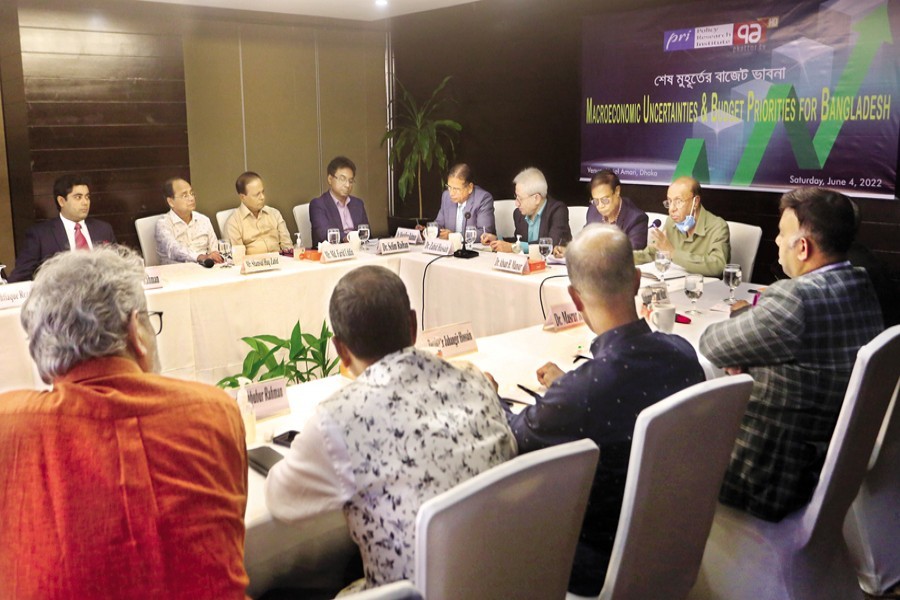 Former advisor to a caretaker government AB Mirza Azizul Islam speaking at a pre-budget discussion on 'Macroeconomic Uncertainties and Budget Priorities for Bangladesh' held at a city hotel on Saturday, organised by PRI and Ekattor TV. — FE photo