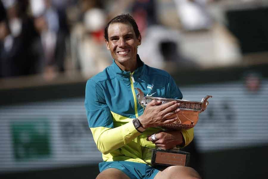 Spain's Rafael Nadal posing with trophy after winning the men's singles final against Norway's Casper Ruud in Paris on Sunday –Reuters photo