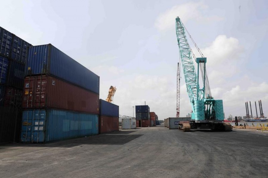 Cranes and containers seen at APM Terminals at the gateway port in Apapa, Lagos, Nigeria July 30, 2019. Picture taken July 30, 2019. REUTERS/Temilade Adelaja/File Photo