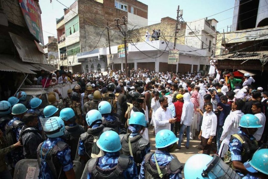 Protestors clash with police during a protest demanding the arrest of Bharatiya Janata Party (BJP) member Nupur Sharma for her comments on Prophet Muhammad, in Prayagraj, India, June 10, 2022. Reuters