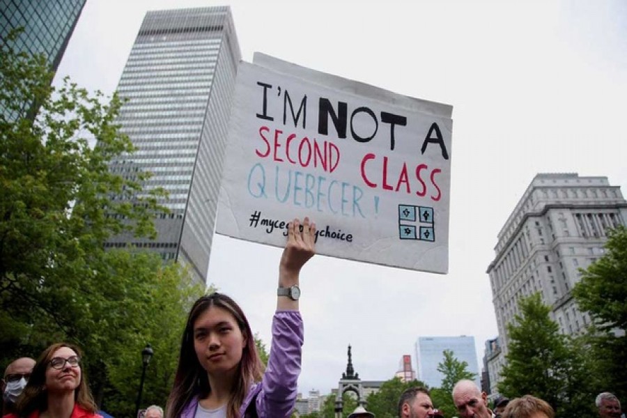 Anglophone opponents of Quebec's French-language law Bill 96 protest in downtown Montreal, Quebec, Canada May 26, 2022. REUTERS/Christinne Muschi