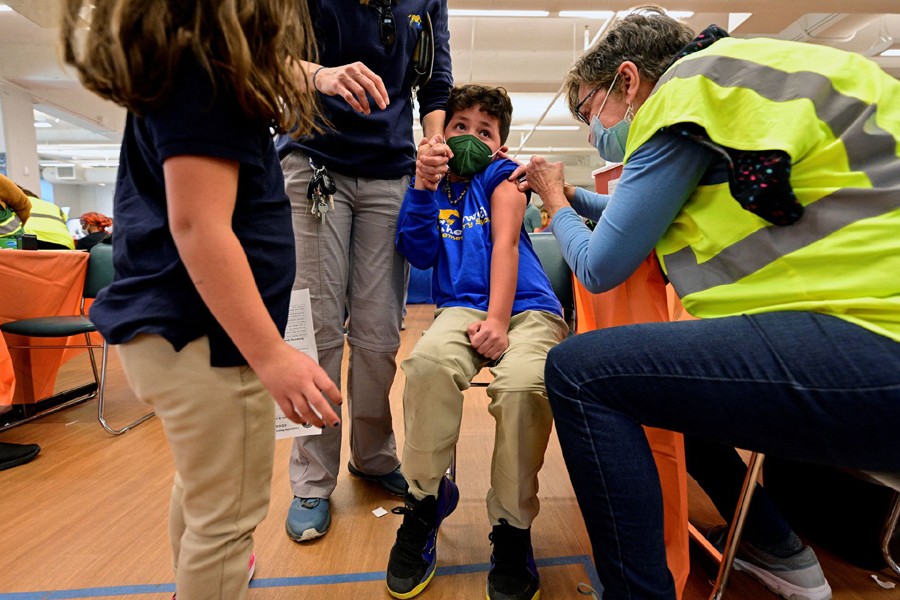 A child reacts while receiving a dose of the Pfizer-BioNTech coronavirus disease (Covid-19) vaccine at Smoketown Family Wellness Center in Louisville, Kentucky, US on November 8, 2021 — Reuters/Files