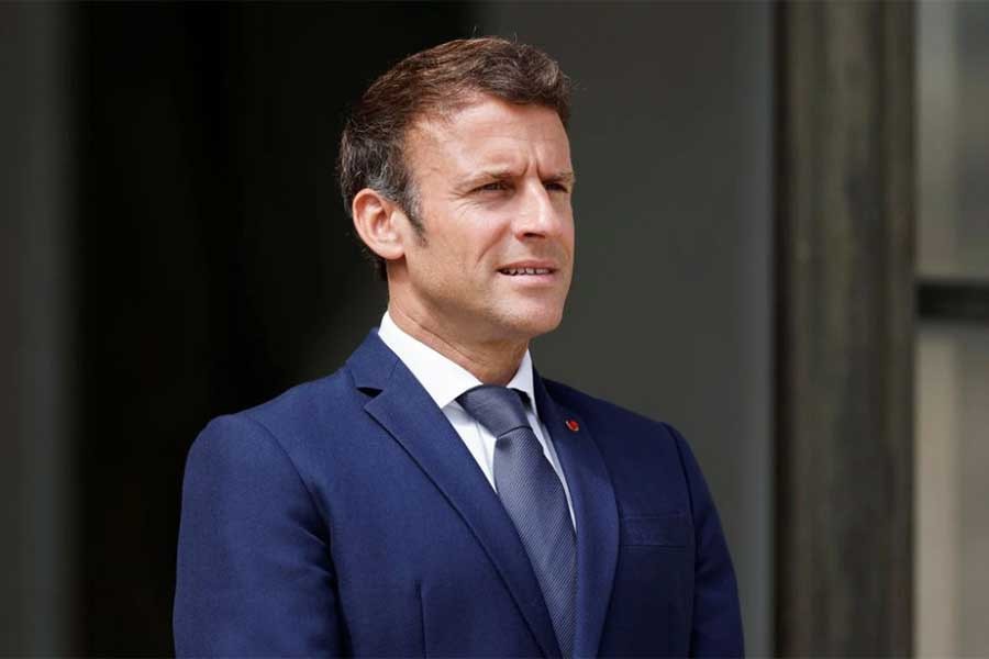 French President Emmanuel Macron welcoming a guest at the Elysee Palace in Paris recently –Reuters file photo