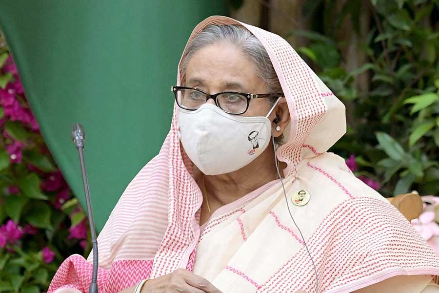 Prime Minister Sheikh Hasina presiding over the 17th ECNEC meeting of the current fiscal year (FY22) held at the NEC Conference Room in the city’s Sher-e-Bangla Nagar area on Tuesday –PID Photo