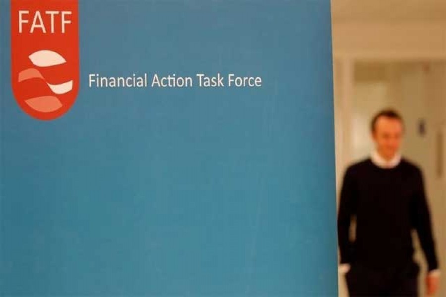 FILE PHOTO: The logo of the FATF (the Financial Action Task Force) is seen during a news conference after a plenary session at the OECD Headquarters in Paris, France, October 18, 2019. REUTERS/Charles Platiau