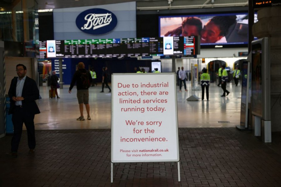 A sign displaying info is seen at Waterloo station, on the first day of national rail strike in London, Britain, June 21, 2022. REUTERS/Henry Nicholls