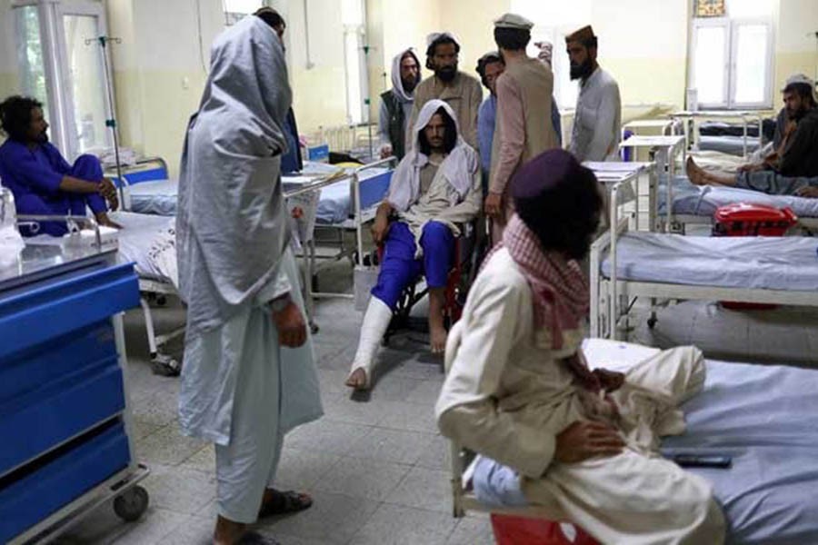 Afghans, who were injured in the recent earthquake, receive treatment at a hospital ward in Sharana, Afghanistan, Jun 24, 2022. Reuters