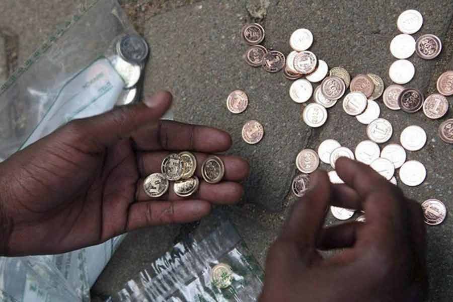 Zimbabwe to introduce gold coins as local currency tumbles