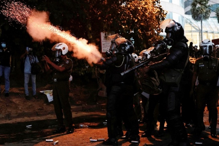 Police use tear gas and water cannons to disperse demonstrators near President's residence during a protest demanding the resignation of President Gotabaya Rajapaksa, amid the country's economic crisis, in Colombo, Sri Lanka, Jul 8, 2022. Reuters