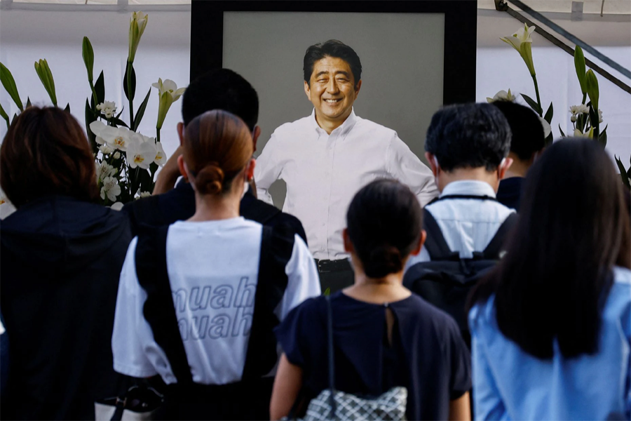 People lay flowers on a flower offering at Abe at Zojoji Temple, where the vigil and funeral of late former Japanese Prime Minister Shinzo Abe, who was shot while campaigning for a parliamentary election, will be held, in Tokyo, Japan on July 11, 2022 — Reuters photo