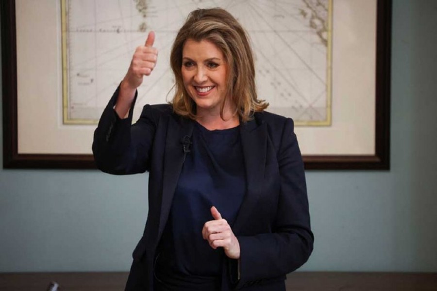 British Conservative MP Penny Mordaunt speaks to the media at an event to launch her campaign to be the next Conservative leader and Prime Minister, in London, Britain Jul 13, 2022. REUTERS/Henry Nicholls