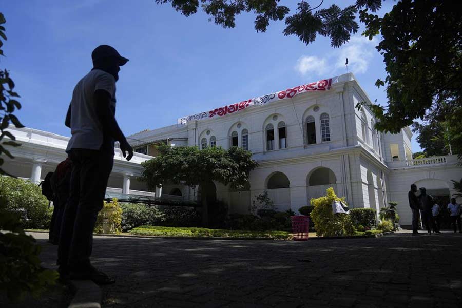 A protester standing outside the official residence of Sri Lankan President Gotabaya Rajapaksa in Colombo on Thursday –AP Photo