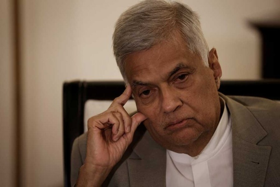 Sri Lanka's Prime Minister Ranil Wickremesinghe gestures as he speaks during an interview with Reuters at his office in Colombo, Sri Lanka, May 24, 2022. Reuters