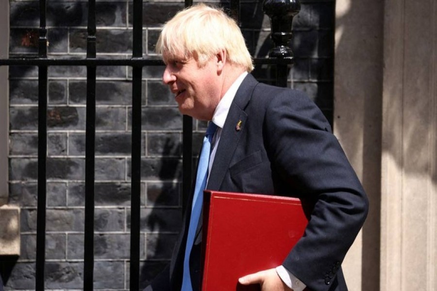 British Prime Minister Boris Johnson walks outside Downing Street in London, Britain, July 20, 2022. REUTERS/Henry Nicholls