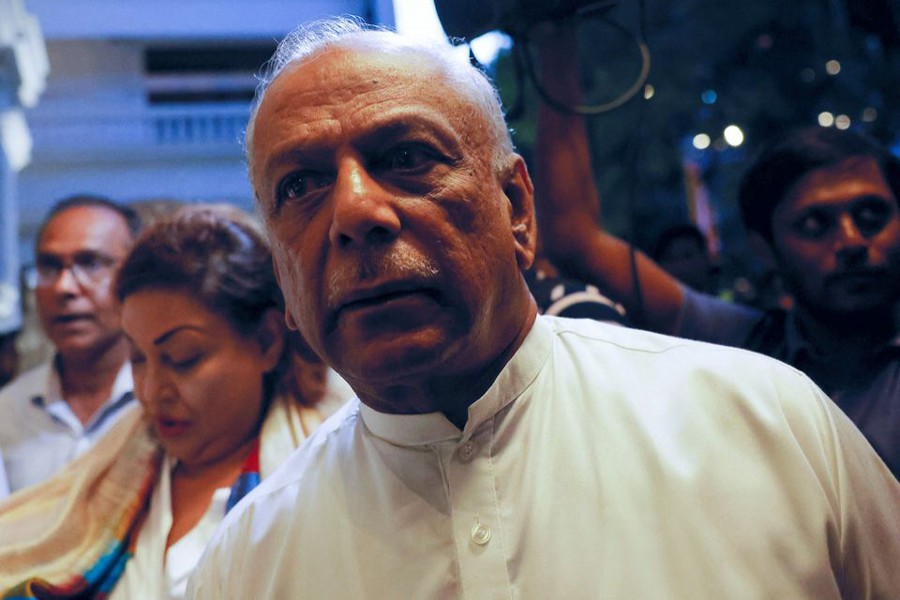 Dinesh Gunawardena, Leader of the House of Parliament arrives at a Buddhist temple as he waits for Ranil Wickremesinghe who has been elected as the Eighth Executive President under the Constitution, amid the country's economic crisis, in Colombo, Sri Lanka on July 20, 2022 — Reuters photo