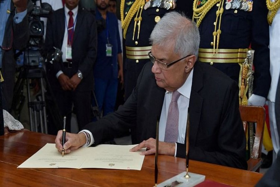 Ranil Wickremesinghe is sworn in as new president of Sri Lanka by Chief Justice Jayantha Jayasuriya at the parliament, amid the country's economic crisis, in Colombo, Sri Lanka July 21, 2022. Sri Lankan President's Office via REUTERS