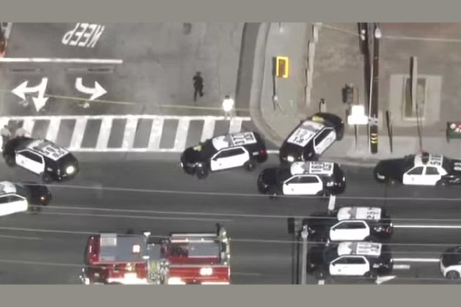 Police cars seen near the Peck Park after the shooting on Sunday, Jul 24, 2022 - Reuters photo