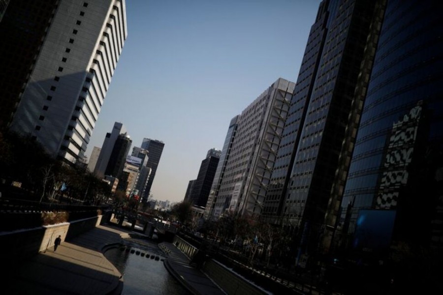 A man walks along the Cheonggye stream in central Seoul, South Korea January 25, 2017. REUTERS/Kim Hong-Ji