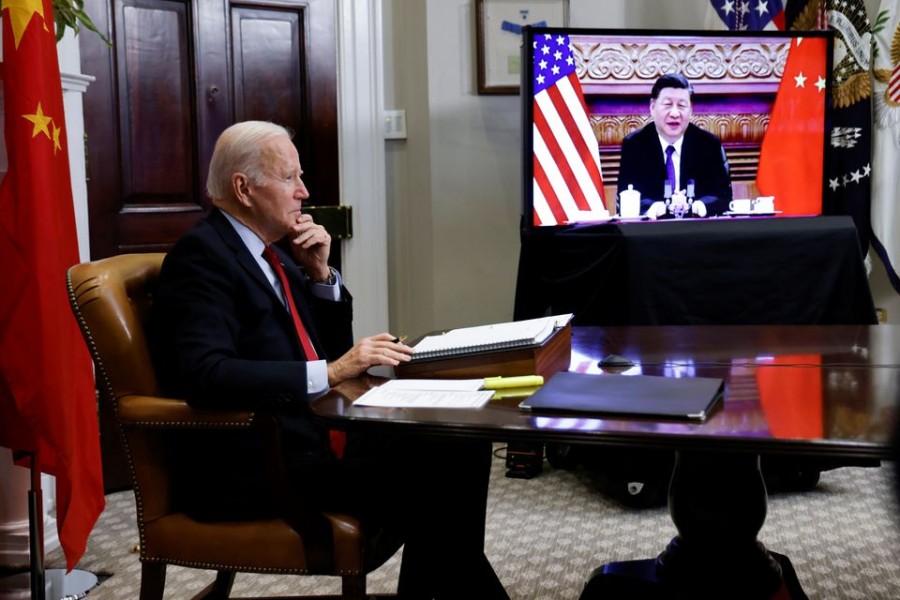 U.S. President Joe Biden speaks virtually with Chinese leader Xi Jinping from the White House in Washington, U.S. November 15, 2021. REUTERS/Jonathan Ernst