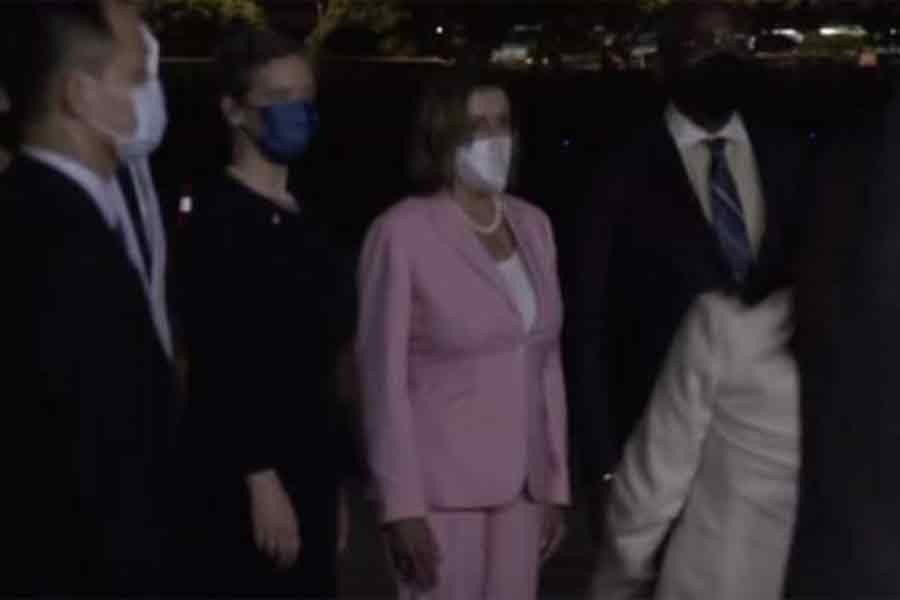 US House of Representatives Speaker Nancy Pelosi leaving the plane after landing at an airport in Taiwan on Tuesday