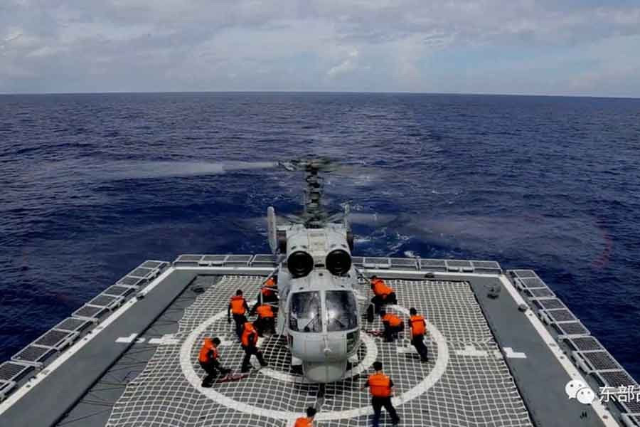 A Chinese Navy Force helicopter taking part in military exercises in the waters around Taiwan at an undisclosed location on Monday -Reuters photo