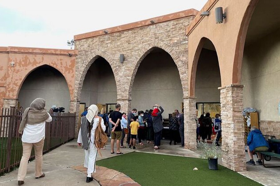 Participants in an interfaith memorial ceremony enter the New Mexico Islamic Center mosque to commemorate four murdered Muslim men, hours after police said they had arrested a prime suspect in the killings, in Albuquerque, New Mexico, US on August 9, 2022 — Reuters photo