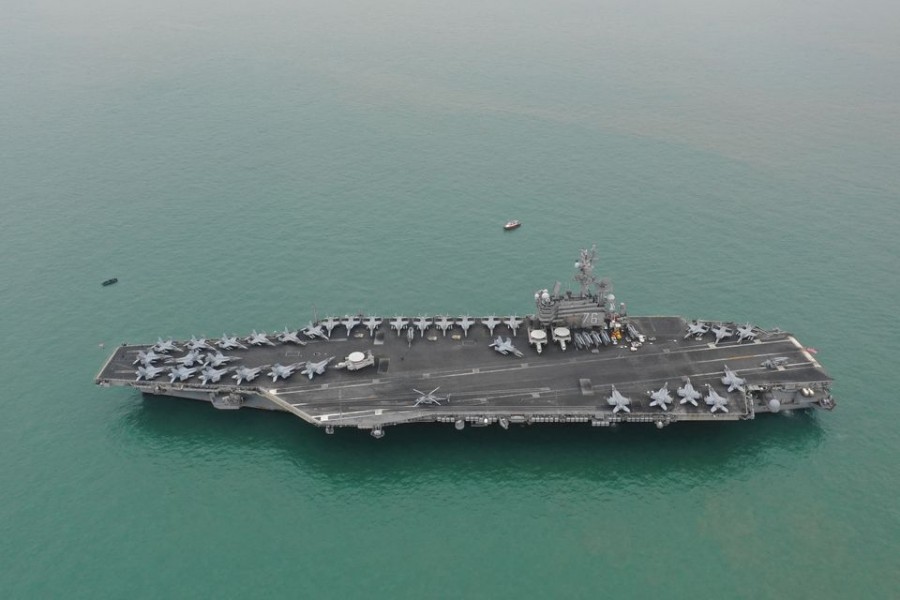 US Navy aircraft carrier USS Ronald Reagan leaves Victoria Harbour after a visit to Hong Kong, China November 25, 2018. Liang Yingfei/Caixin Media via REUTERS/File Photo