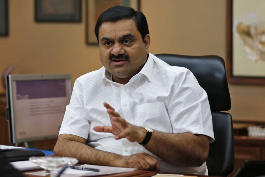 Indian billionaire Gautam Adani speaks during an interview with Reuters at his office in the western Indian city of Ahmedabad April 2, 2014. REUTERS/Amit Dave/File Photo