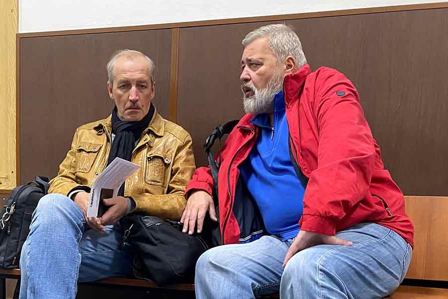 Novaya Gazeta newspaper's editor-in-chief Dmitry Muratov and deputy editor-in-chief Sergei Sokolov sitting in a corridor before a court hearing of a case to revoke the newspaper's media license in Moscow on Monday –Reuters photo