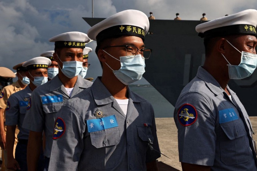 Members of the navy walk to position at a navy base in Penghu Islands, Taiwan, August 30, 2022. REUTERS/Ann Wang/File Photo