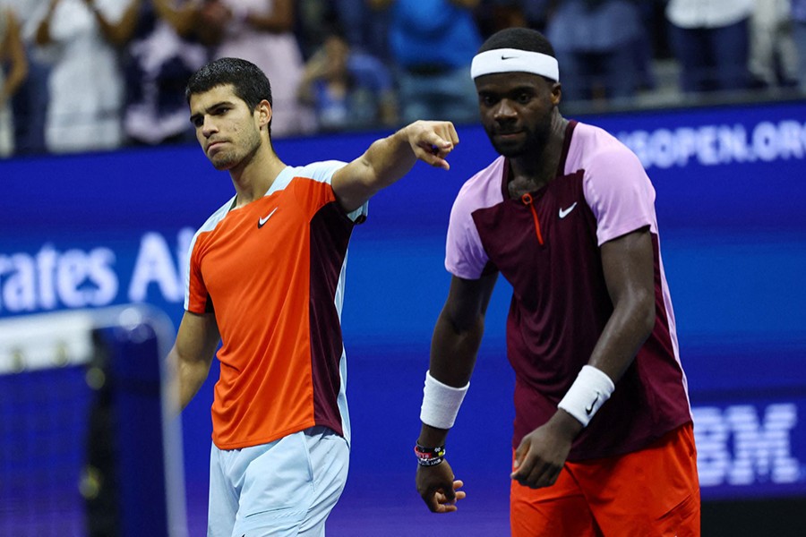 Spain's Carlos Alcaraz with Frances Tiafoe of the US after winning the semi final match of US Open at Flushing Meadows, New York, United States on September 9, 2022 — Reuters photo