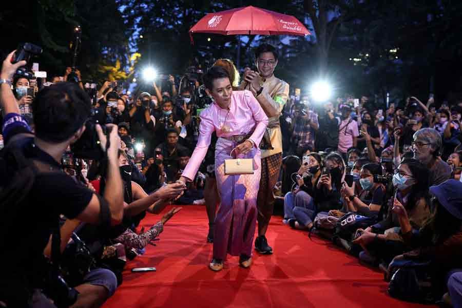 Protesters performing on a red carpet while taking part in a protest against the government and to reform monarchy in Bangkok on October 29 in 2020 –Reuters file photo