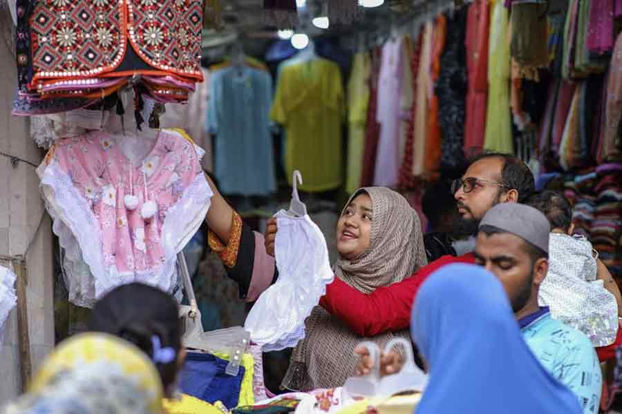 People shopping at a market in Dhaka on July 16 last year –AP file photo